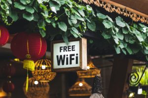 Free Wi-Fi sign hanging in traditional chinese street restaurant