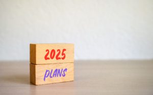 2025 plans in wooden blocks. Setting goal, target for next year.